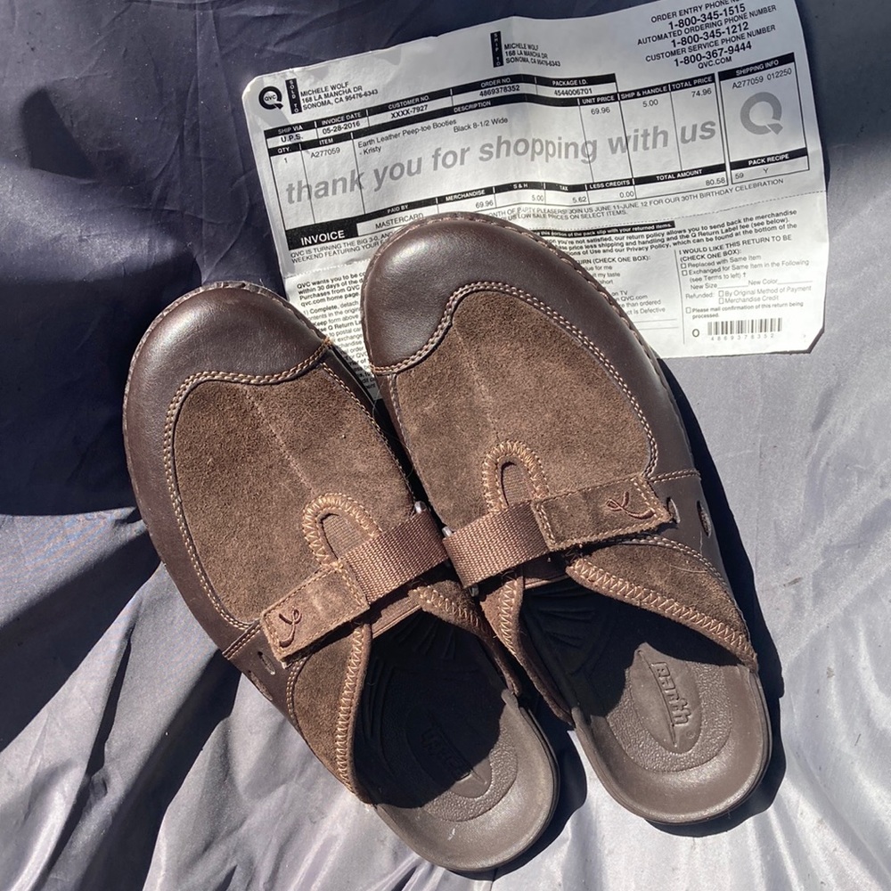 Brown earth clog style flats